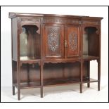 An early 20th Century Edwardian mahogany chiffonier sideboard with central carved panel cabinet