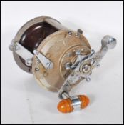 A vintage 20th Century Grice & Young Christchurch Tatler Big Game Sea fishing Reel 4.5" diameter x