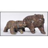 Two good quality 20th century bronze sculpture figurines of a mother bear and her cub in the
