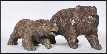 Two good quality 20th century bronze sculpture figurines of a mother bear and her cub in the