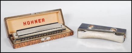 Two early 20th Century German harmonicas / mouth organs to include to include a Hohner 64 Chromonica