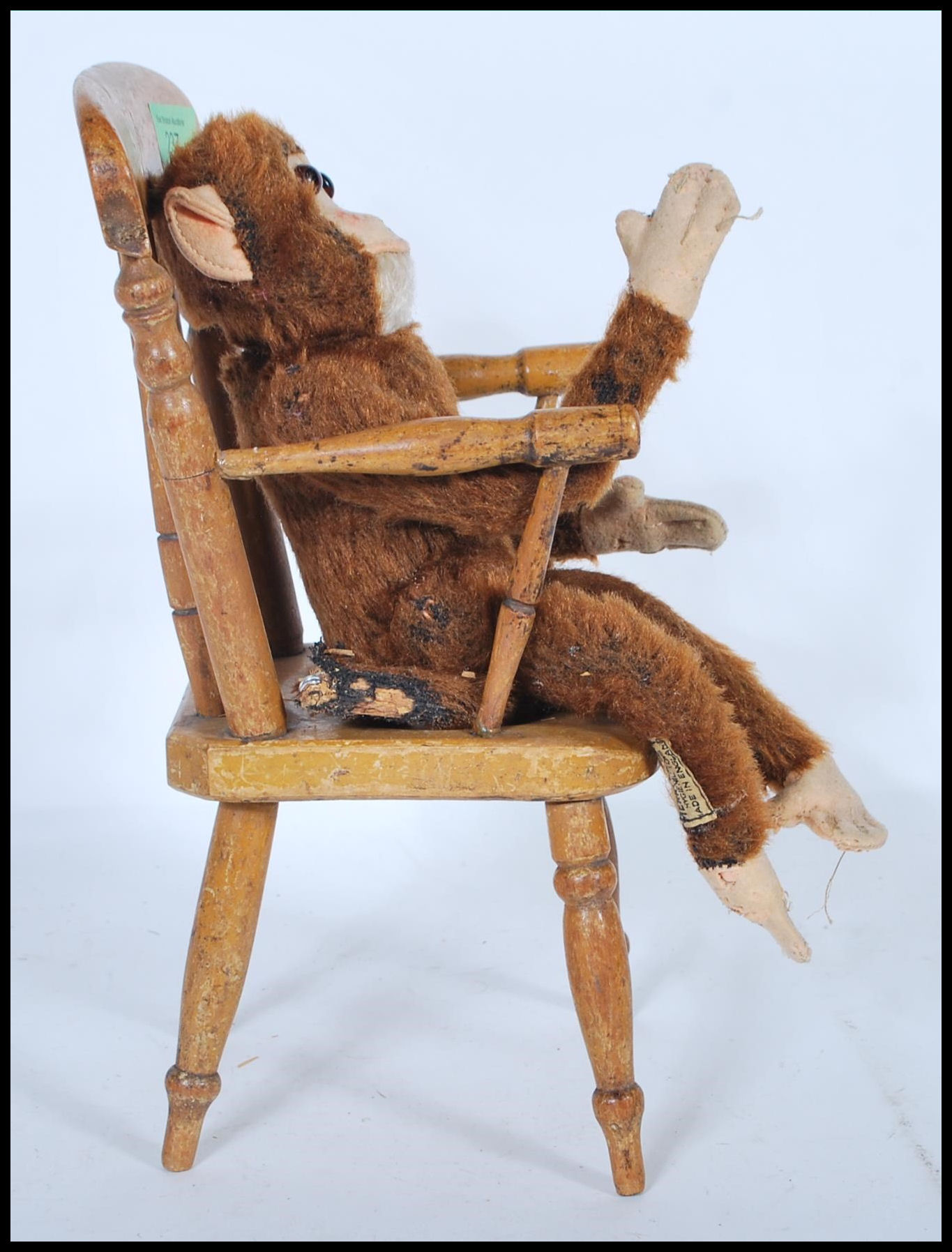 A vintage 1950's Merrythought made soft toy straw filled monkey with bead eyes and original label - Image 3 of 5