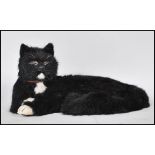 A taxidermy style cat modelled from rabbit fur Trim ship's cat Matthew Flinders, Trim was the