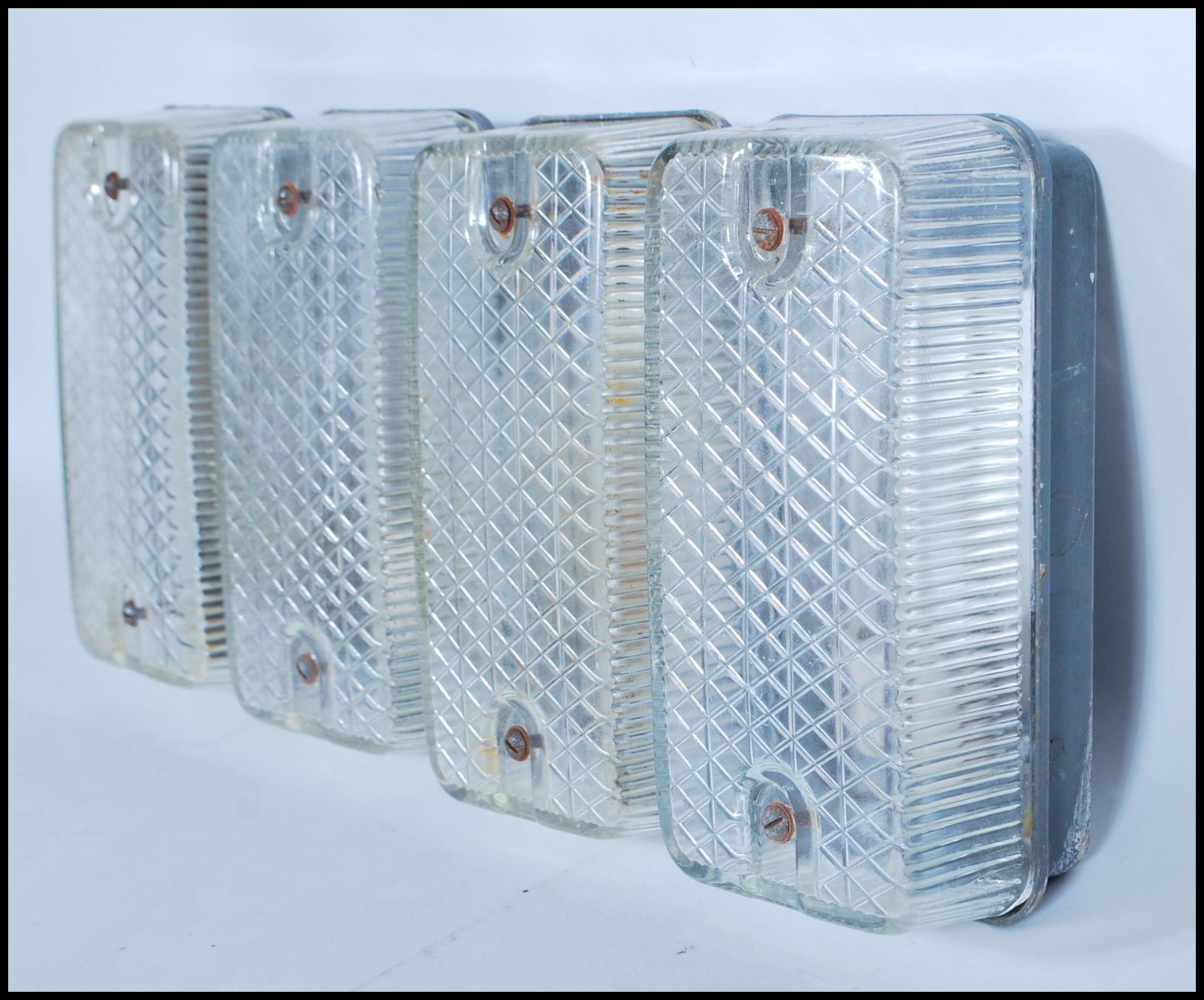 A group of four vintage retro 20th Century industrial prismatic glass bulkhead lights with metal - Bild 3 aus 6
