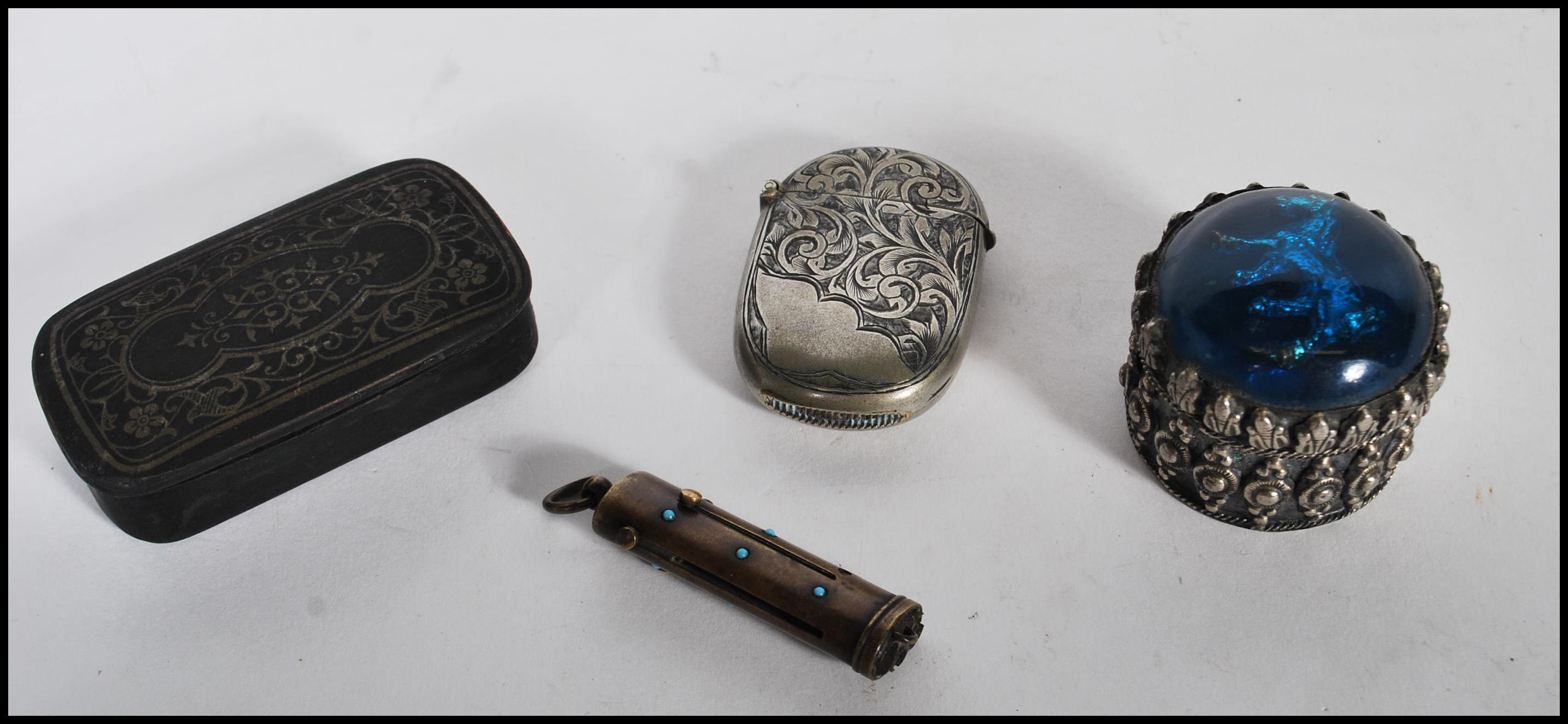 A selection of tools and cases to include a Georgian ebonised snuff box having scrolled foliate