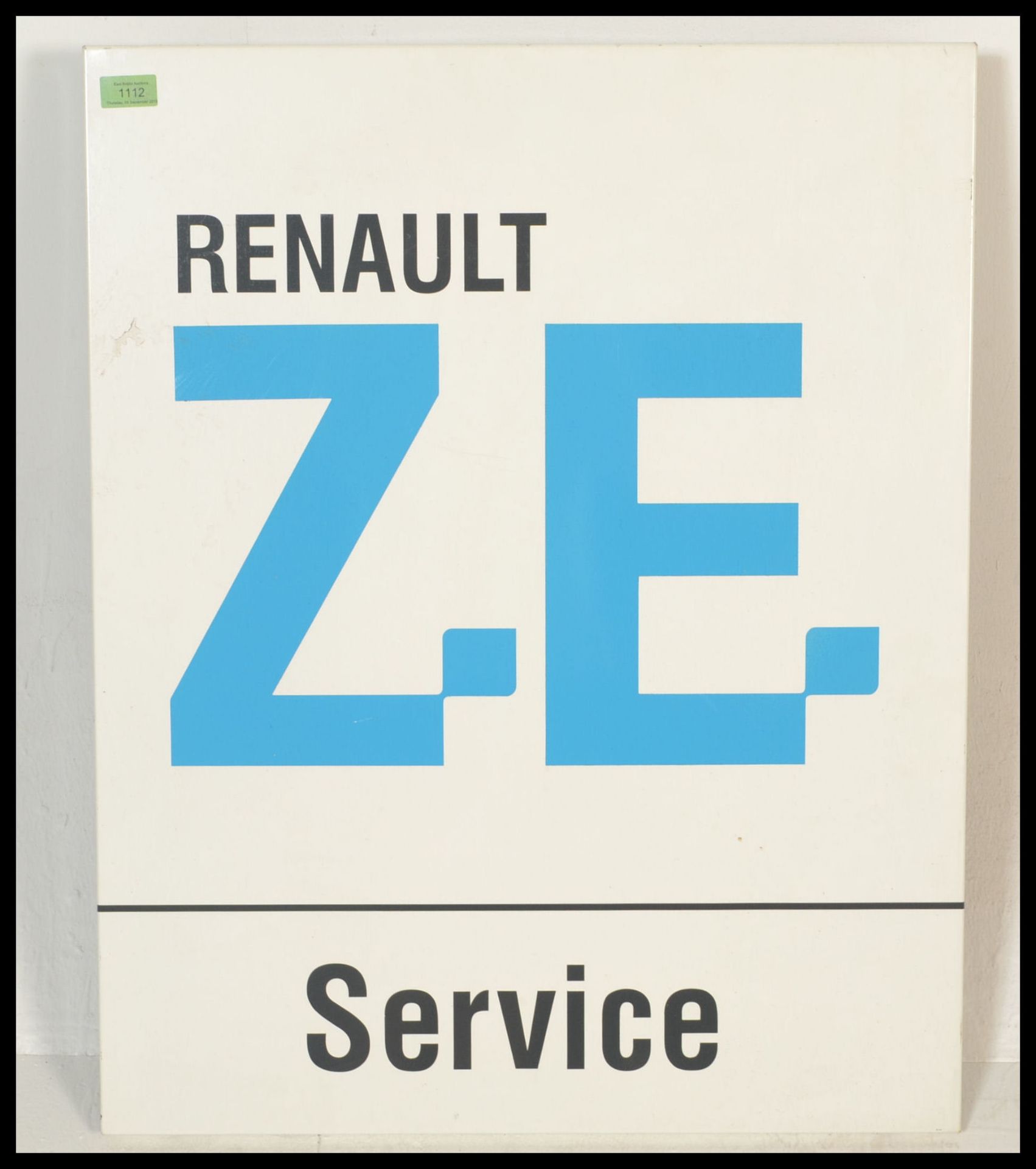 A 20th Century Renault garage showroom sign having a white finished ground with Renault in black