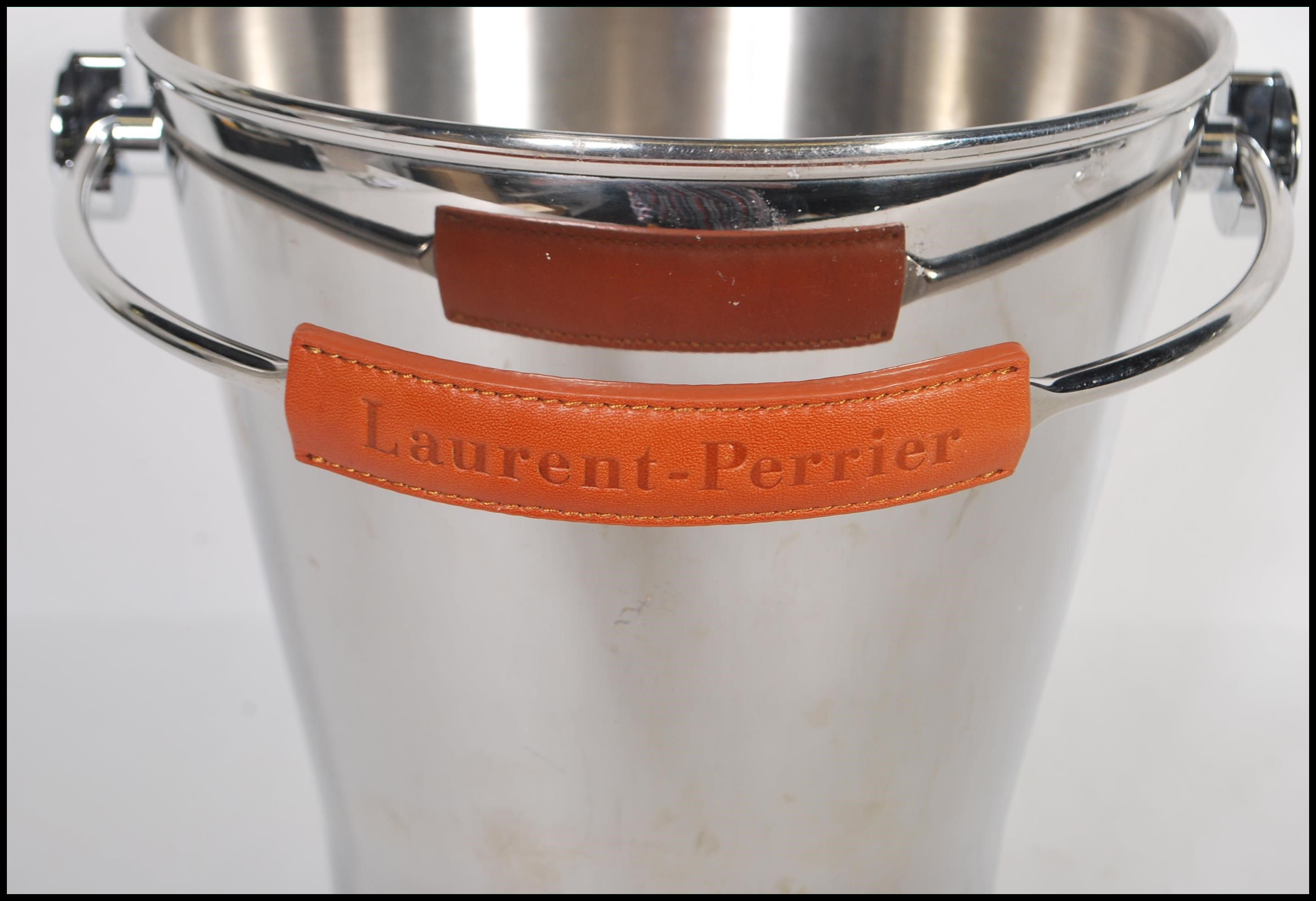 A vintage Laurent Perrier brushed steel champagne ice bucket having a leather swing handle and - Image 4 of 4