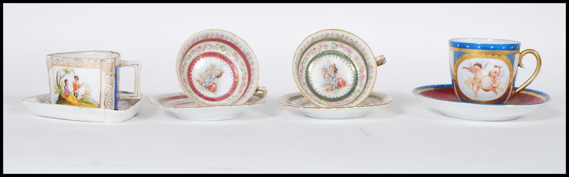 A collection of 19th Century Austrian porcelain bone china cabinet cups and saucers comprising an