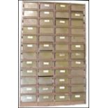 A vintage 20th Century large bank of 48 industrial / utility painted steel storage drawers each