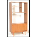 A retro 20th Century teak wood room divider bookca