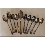 A selection of silver teaspoons to include three Harrison Fisher & Co teaspoons having gadrooned