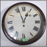 A 19th century Victorian mahogany station clock of circular form having a fusee brass movement.