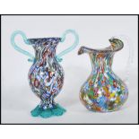 Two 20th Century Murano glass vases both having coloured millefiori designs to include a waisted