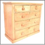 A Victorian 19th Century country scrubbed pine chest of drawers. Two short drawers over three deep