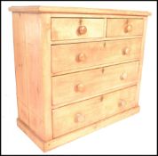 A Victorian 19th Century country scrubbed pine chest of drawers. Two short drawers over three deep