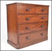A 19th Century mahogany two over three graduating chest of drawers raised on a plinth base with a
