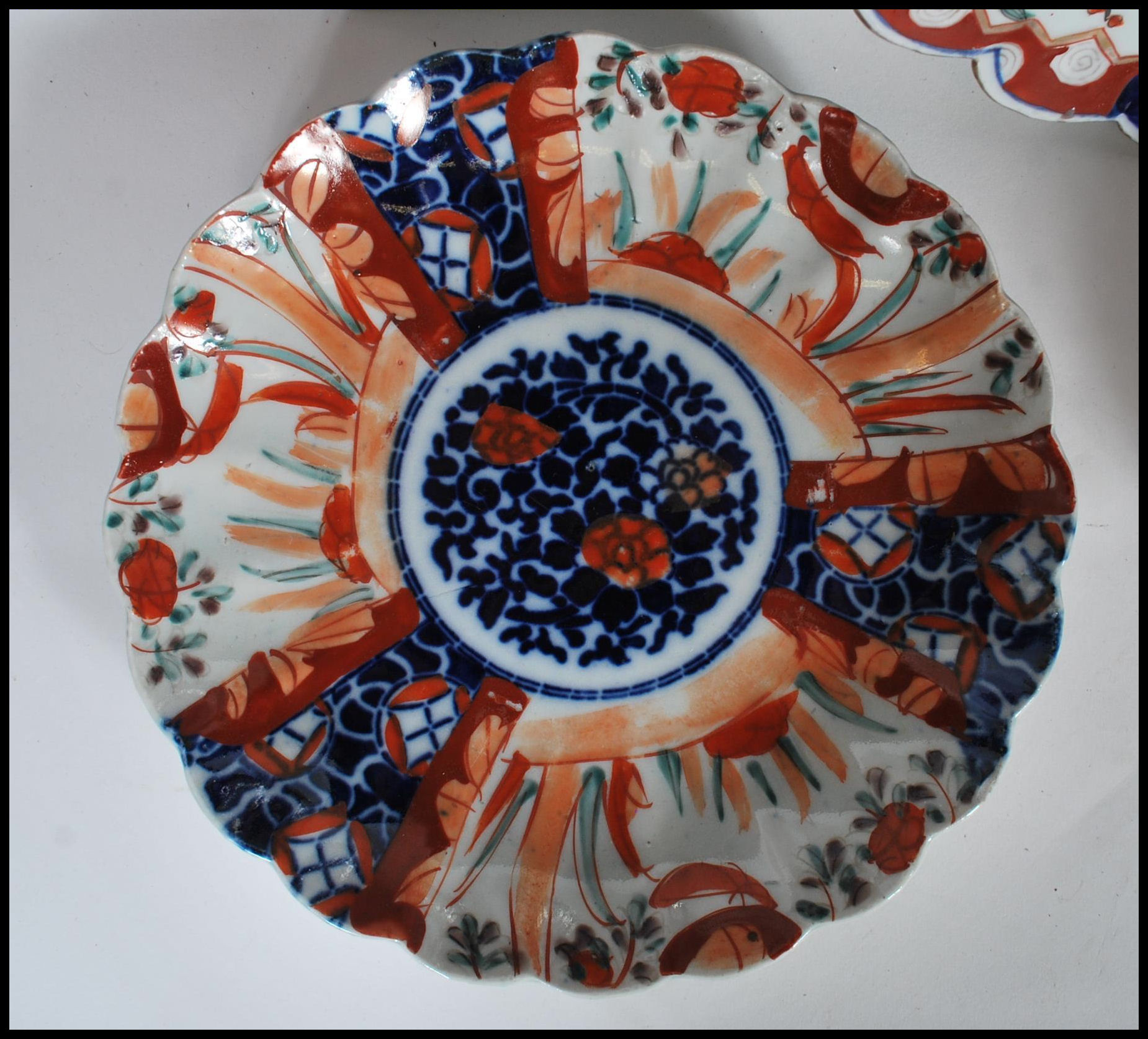 A collection of 20th Century Japanese Imari ceramics to include two wall charger plates having - Image 10 of 15