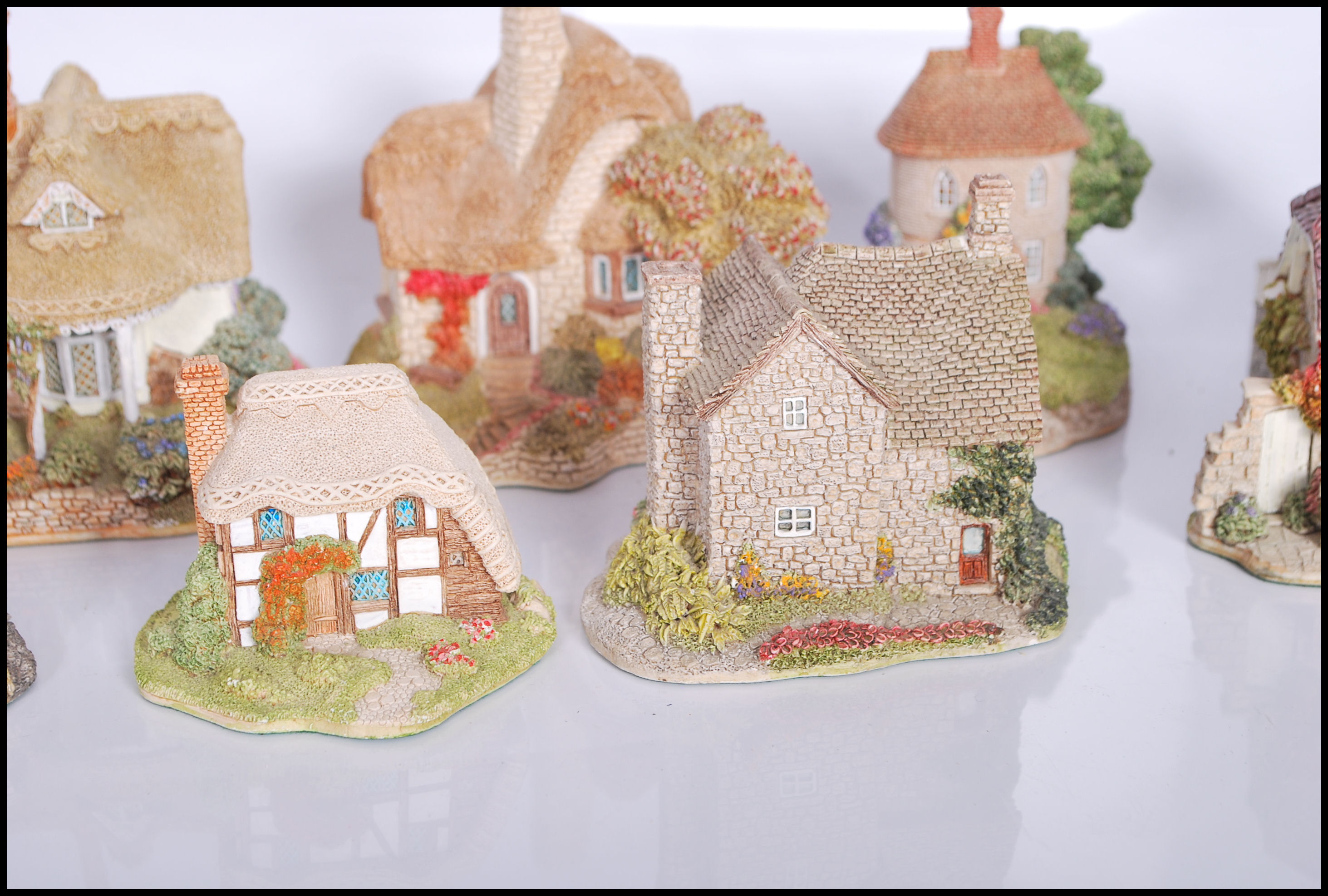 A collection of ten boxed Lilliput Cottages to include Blue Boar, To Have And To Hold, Cradle - Image 4 of 9
