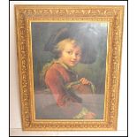 A 20th century framed and glazed print of a Victorian painting depicting a boy with hat and red