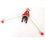 FRENCH CELLULOID CIRCUS CLOWN UNICYCLE TIGHTROPE TOY