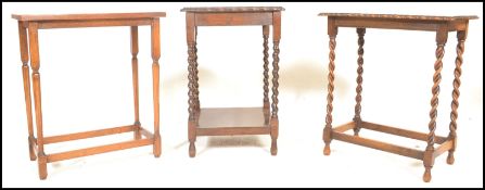 Two early 20th Century Edwardian oak occasional side tables raised on barley twist supports together