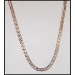 A stamped 925 silver flat link snake chain having a lobster clasp. Weight 42.5g. Measures 55cm.