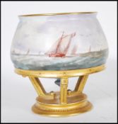 A 20th Century ceramic vase having a bulbous body with hand painted maritime decoration of ships