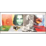 A collection of vinyl long play LP record albums to include Alice Cooper Goes To Hell, Killer,