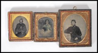 A group of three 19th Century Victorian wet plate photographs two being portraits of gentlemen,