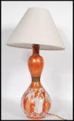 A 20th Century Japanese Kutani ceramic table lamp of gourd form, transfer printed with a thousand