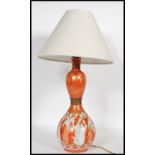 A 20th Century Japanese Kutani ceramic table lamp of gourd form, transfer printed with a thousand