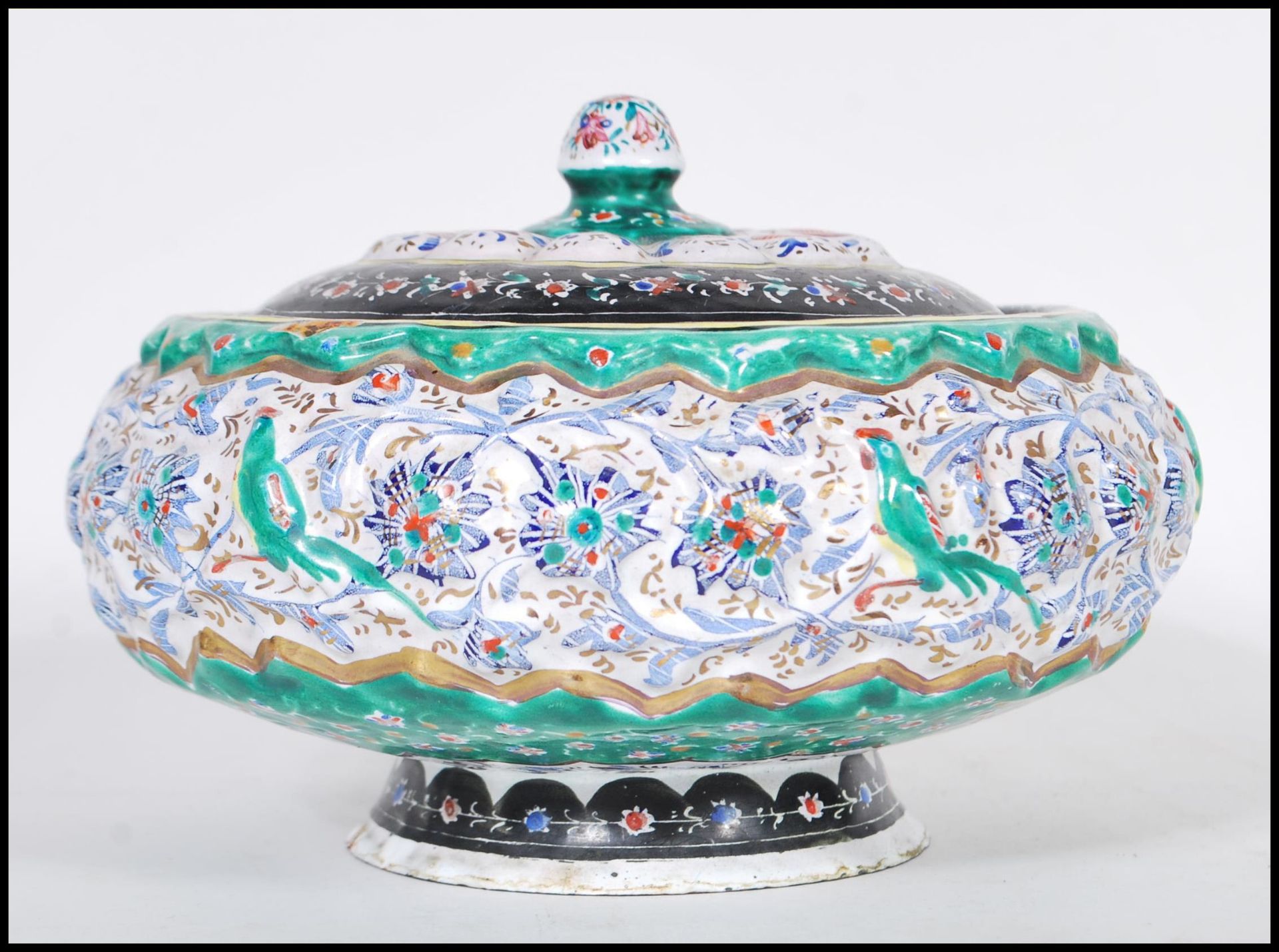 A early 20th Century Chinese copper enameled pot and cover of squat globular form having hand