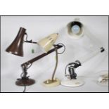 A mid 20th Century retro Herbert Terry Anglepoise desk lamp in a brown colourway having pendant