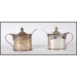 A pair of Zachariah Barraclough & Sons lidded mustard condiments of ovular form having hinged lid