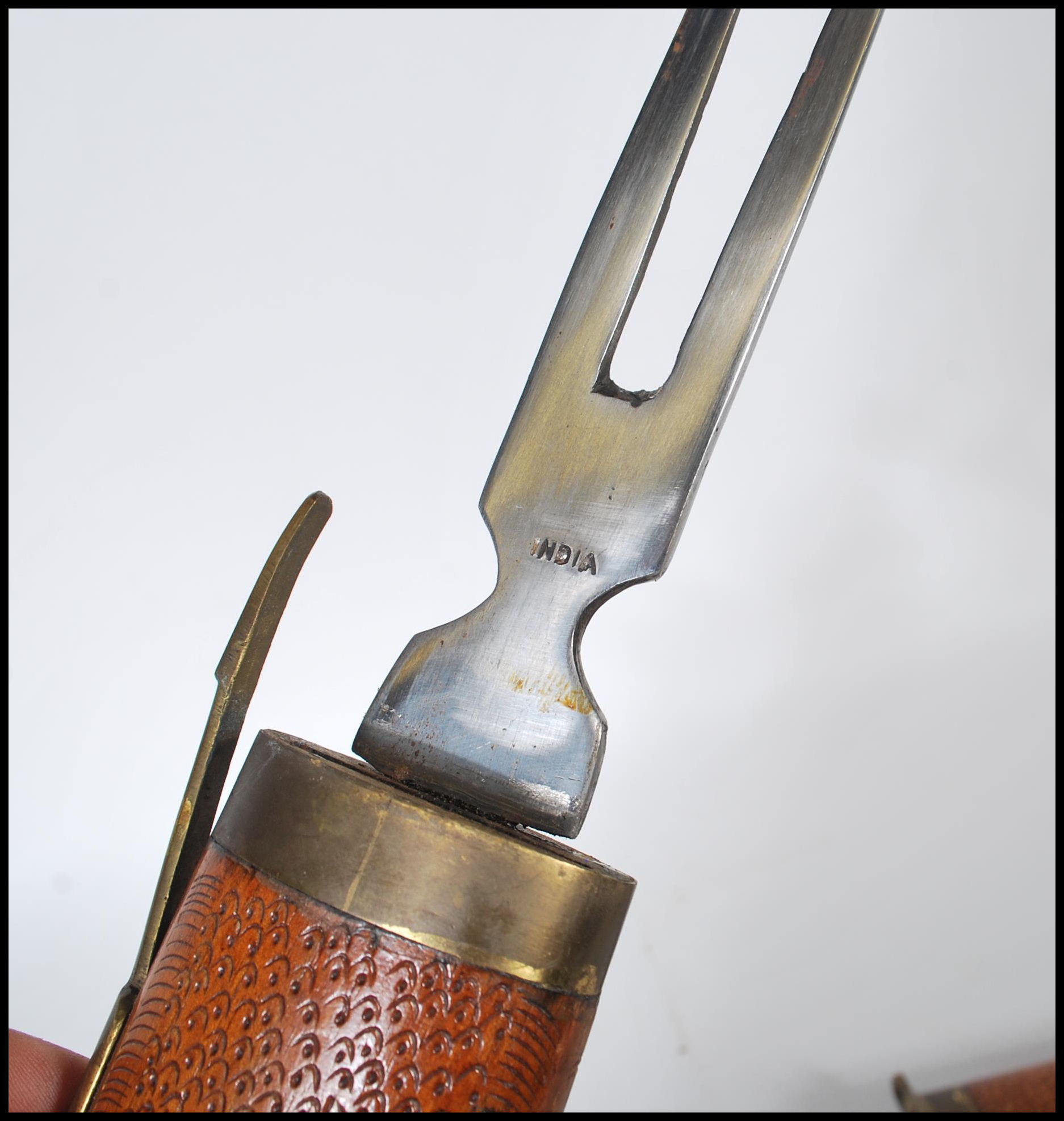 A 20th Century knife and fork carving set, the set carved from hard wood and modelled as a Carp - Image 4 of 4