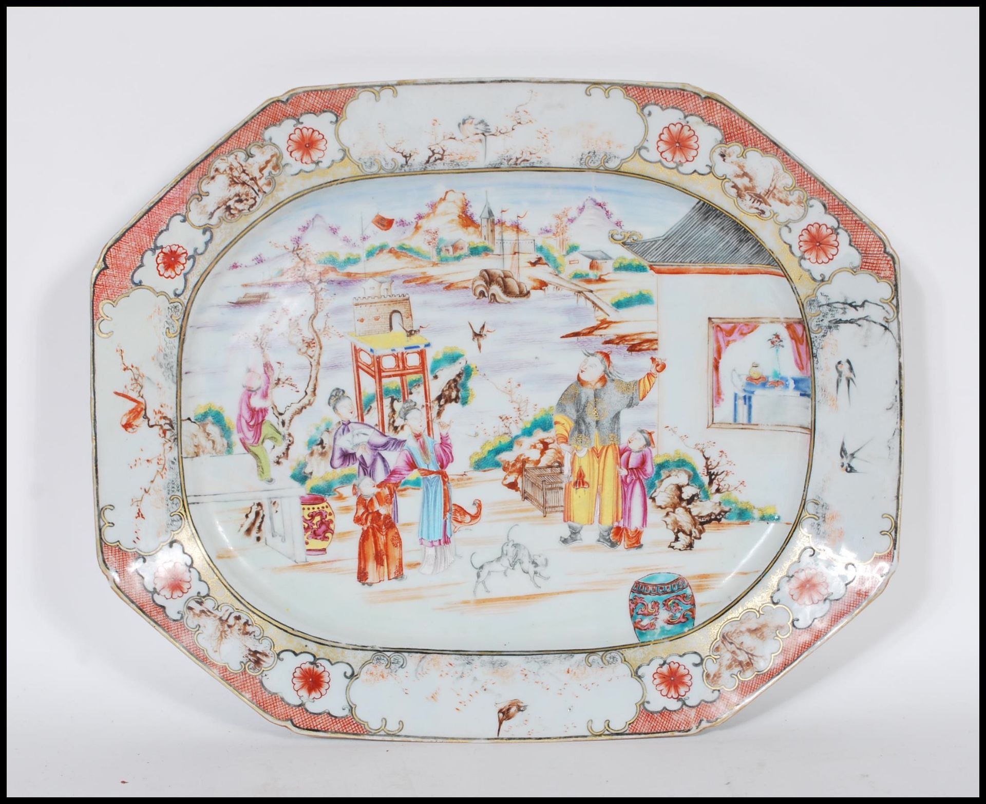 A 18th Century circa 1780 Qing Dynasty famille rose serving platter plate depicting a court yared