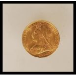 A 1901 22ct gold full sovereign having Queen Victoria's veiled head with George and the dragon to