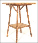 A 19th century Victorian aesthetic movement bamboo occasional / side table. Twin tiers, of square