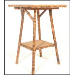 A 19th century Victorian aesthetic movement bamboo occasional / side table. Twin tiers, of square