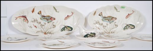 A collection of 20th Century ceramic Johnson Brother's fish pattern ceramics to include two large