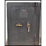 A 19th Century Victorian substantial Tann's cast iron safe, plaque to front reading Tann's
