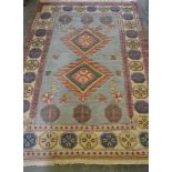 A 20th Century oriental woven blue ground geometri