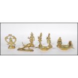 A collection of 20th Century cast bronze Chinese and asiatic figurines, many modelled as deities,