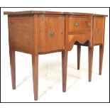 A 19th Century Georgian George III mahogany and inlaid serpentine fronted sideboard, central