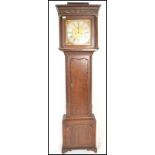 A 18th Century Georgian oak and mahogany cross banded eight-day brass faced, longcase clock. It