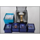 A collection of individually boxed dress jewellery items to include a pair of hallmarked 9ct gold