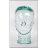 A vintage retro 20th Century milliners  advertising shop display glass phrenology type head of clear