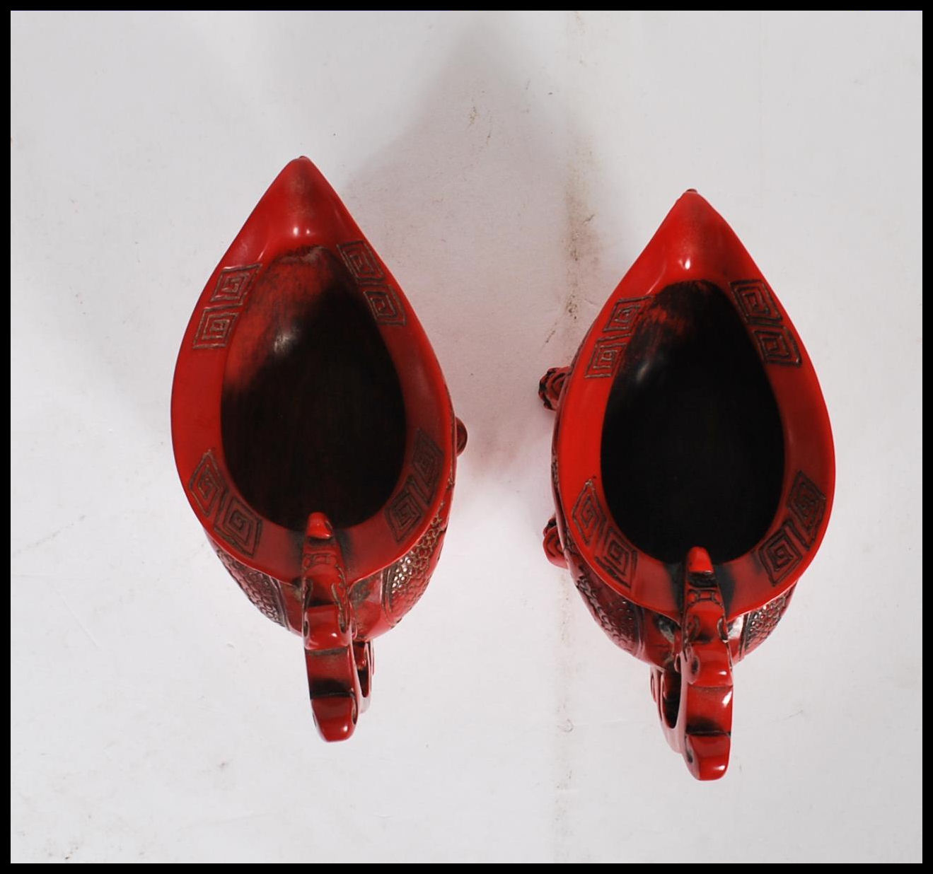 A pair of 20th Century Chinese faux Cinnabar lacquer oil pourers having scrolled decoration with - Image 5 of 6