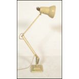 A vintage early 20th Century Herbert Terry anglepoise desk lamp having a pendant shade with