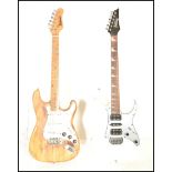 Two 20th Century six string electric guitars to include an Ibanez Gio Stratocaster style six